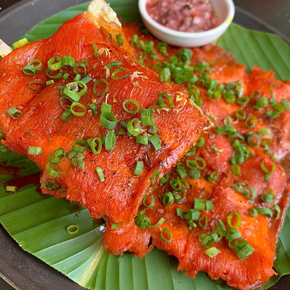 Famous toasted yuca with tuna carpaccio and onion ceviche