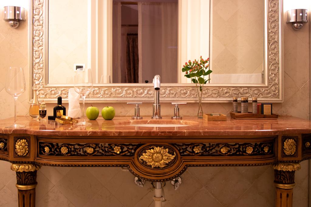 Spacious bathroom sink in Villa Palma Boutique Hotel