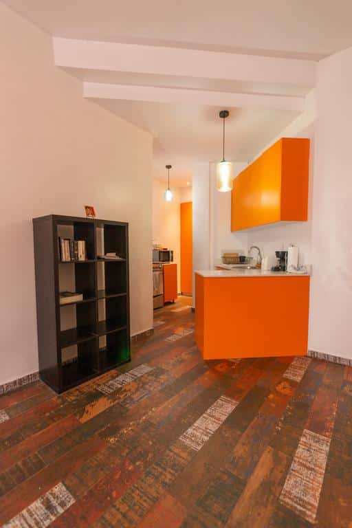 kitchen and book stand in Charming Apartment in Casco Viejo