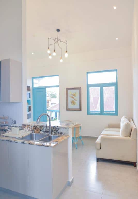 kitchen and living room of  apartment 1A in Flor de Lirio Casco Viejo 