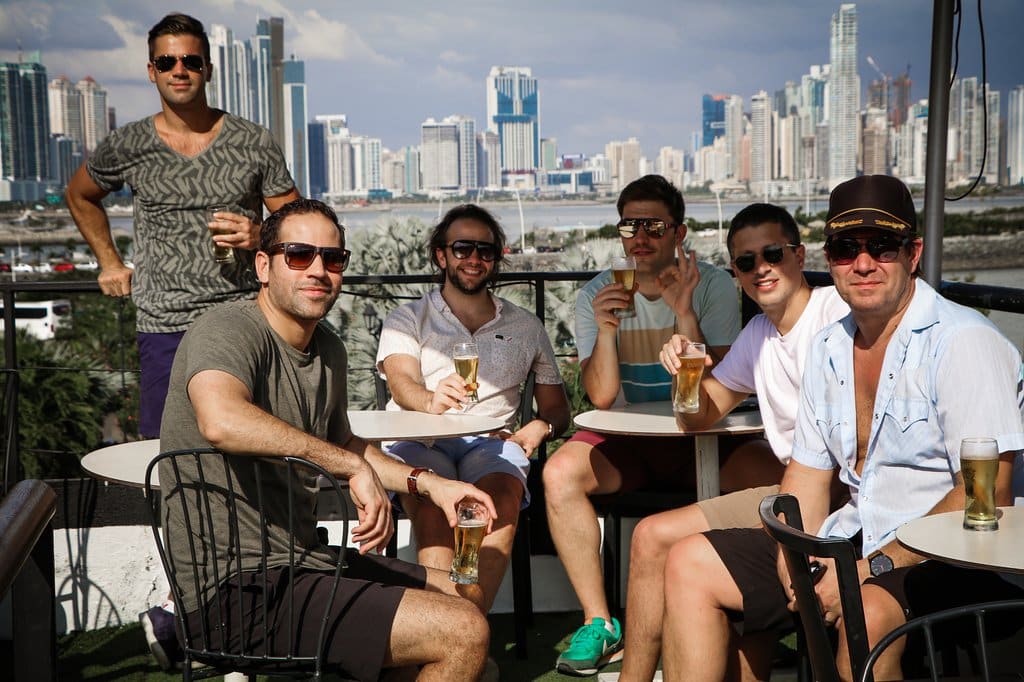 Men enjoying beer at Lazotea Restaurant and Rooftop