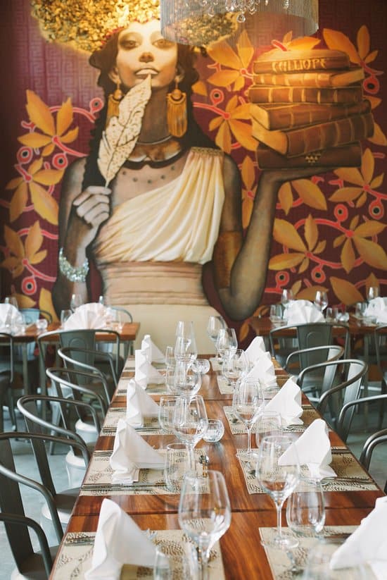 A mural of the Muse Caliope decorates the wall of the Caliope Restaurant