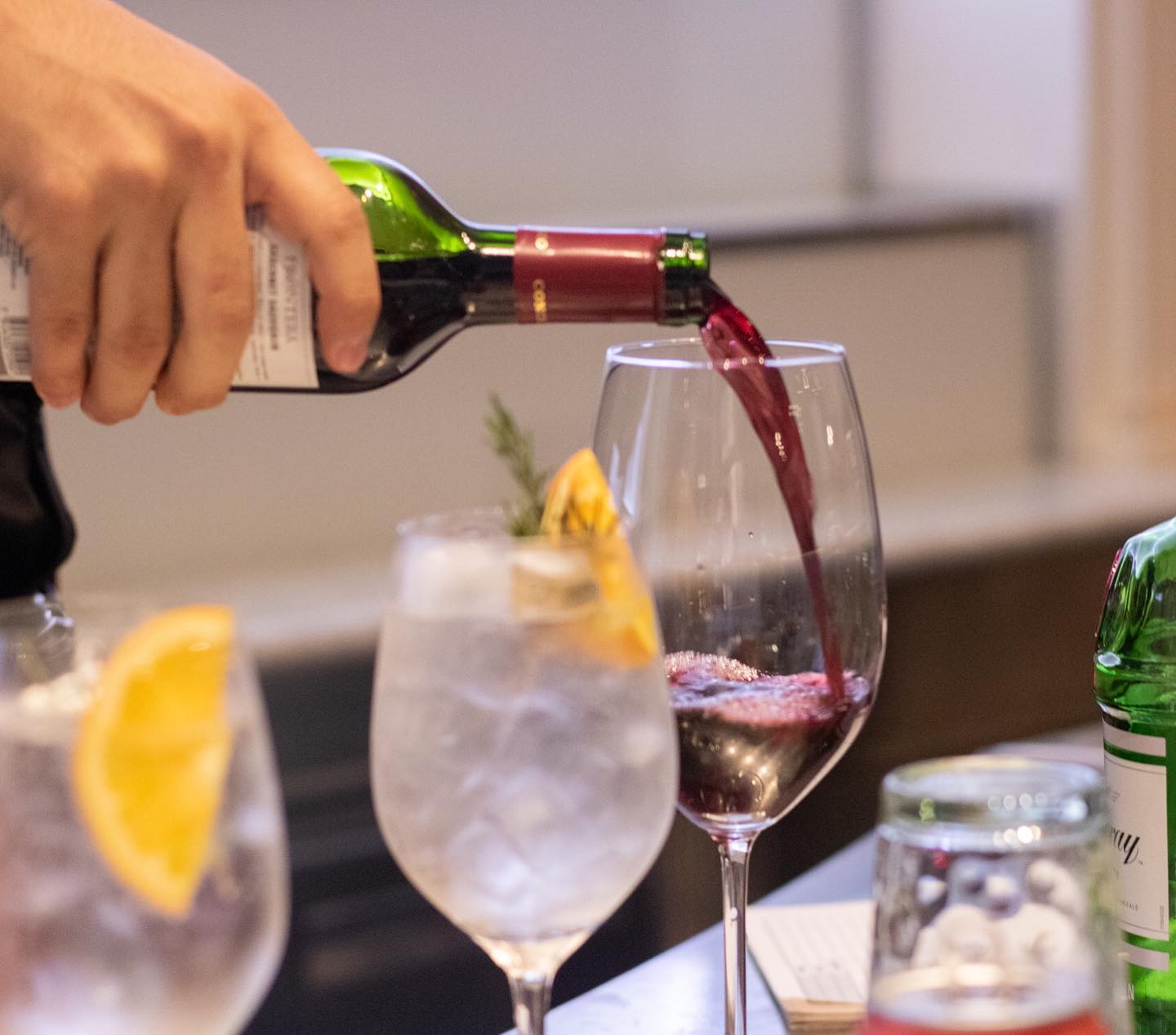 Serving wine in the MED restaurant of Villa Palma Boutique Hotel