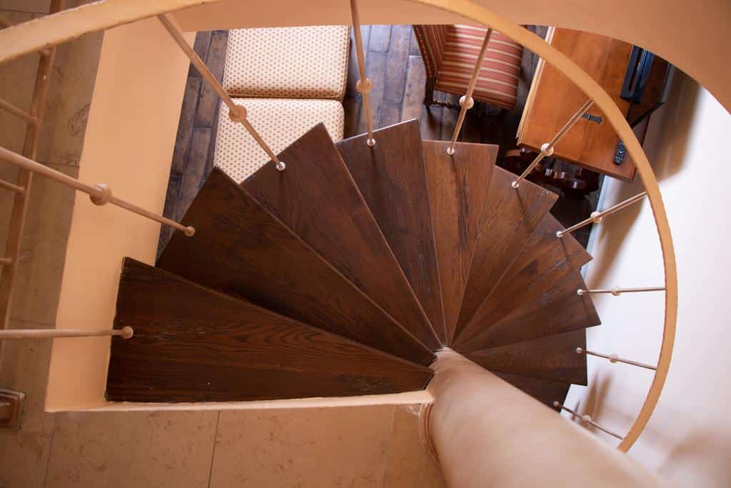 spiral staircase in the Villa Palma Boutique Hotel room